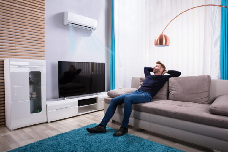 a man enjoying air conditioning