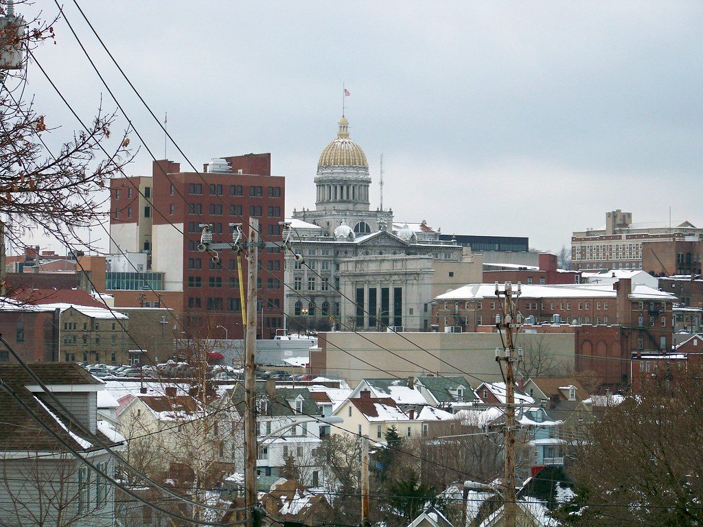 Greensburg, PA Skyline with power lines and city hall with dome in the distance