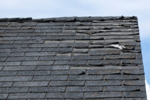 Old Roof with failing shinge system
